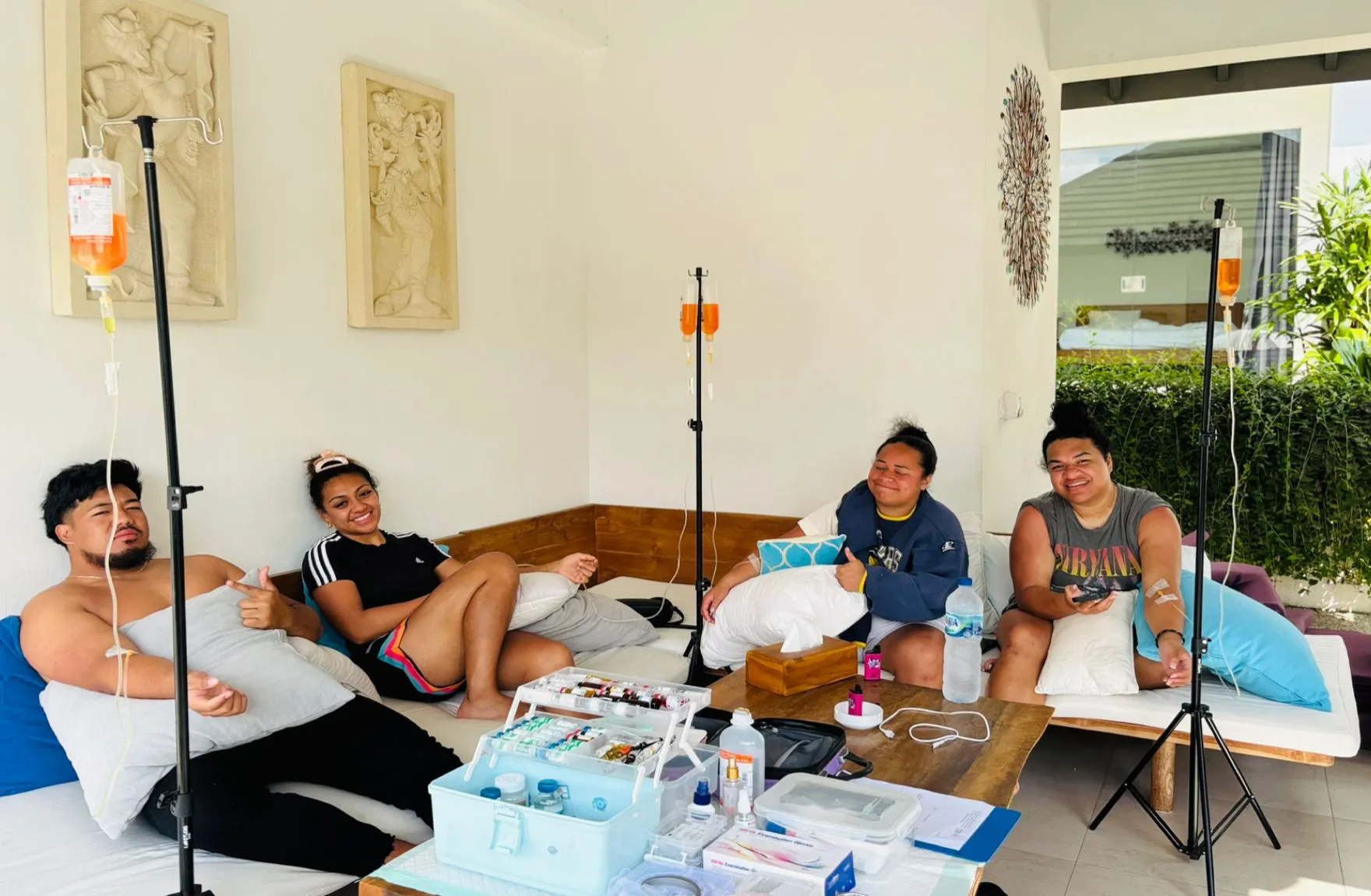 Bali guests receiving mobile IV vitamin therapy from the Infusion Bali team